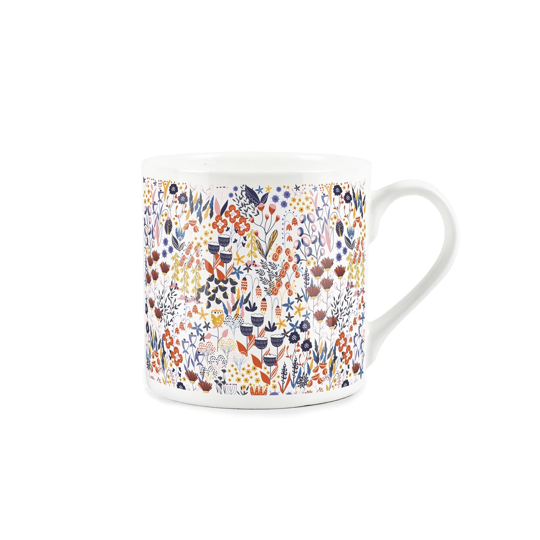 White bone china mug featuring a vibrant blooming summer flower pattern