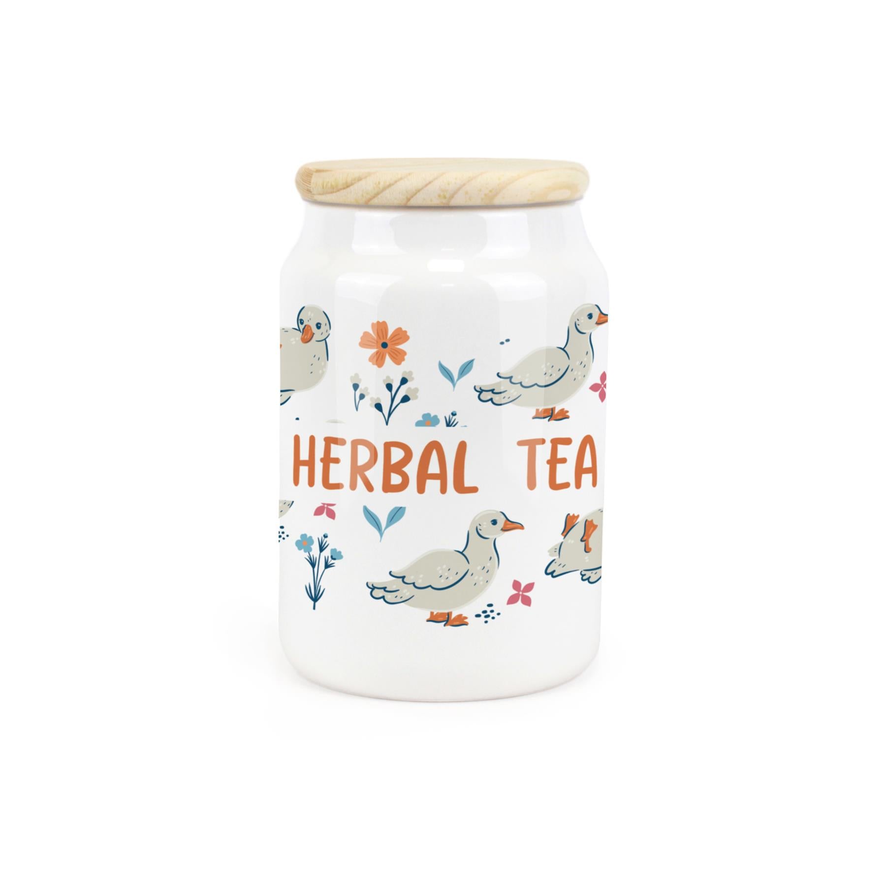 White ceramic canister featuring waddling ducks with a herbal tea design.