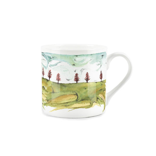 Watercolour landscape with swirling blue sky depicted on a white bone china mug