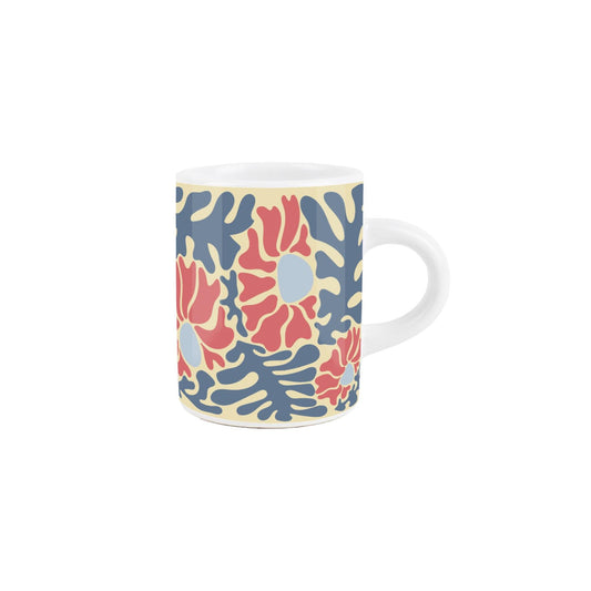 Small ceramic espresso mug adorned with a lovely blue and coral floral design, adding elegance to your morning coffee. 75ml capacity, dishwasher safe.
