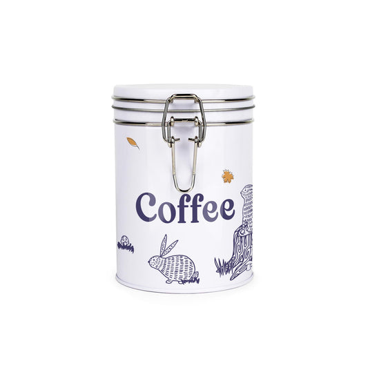 White metal canister with metal clip and lid featuring a simplistic woodland rabbits print with matte blue text detailing saying coffee