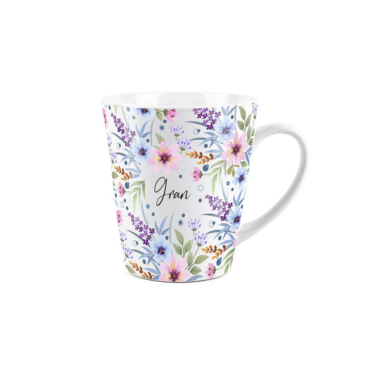 Small white latte mug with purple floral design