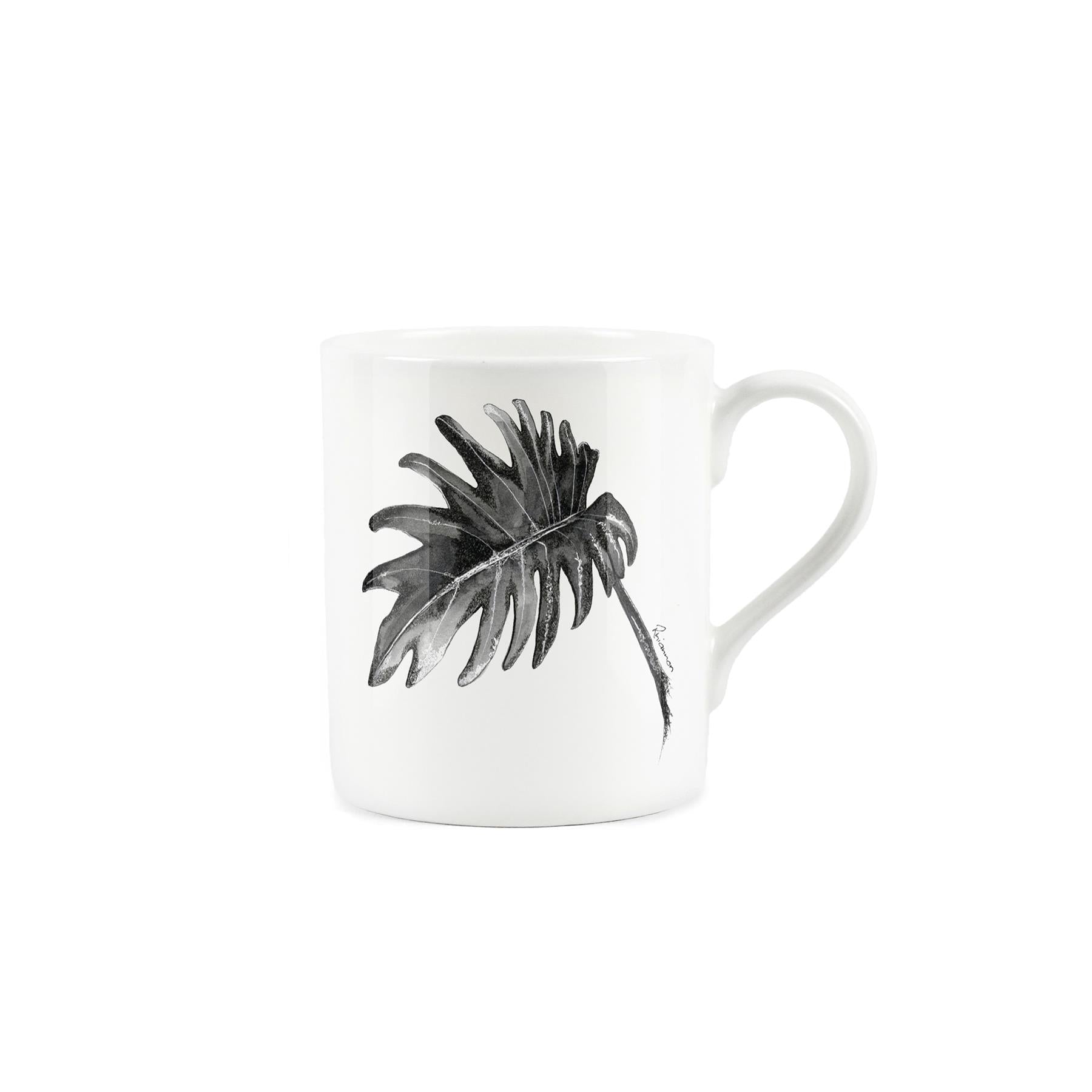 Black cheese plant rendered in ink on a white bone china mug.