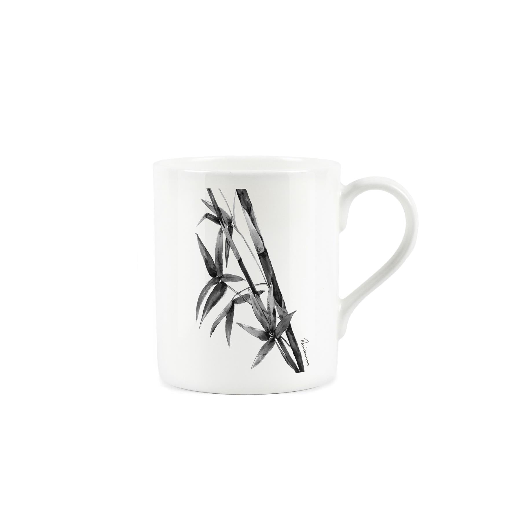Black bamboo plant rendered in dark ink on a white bone china mug.
