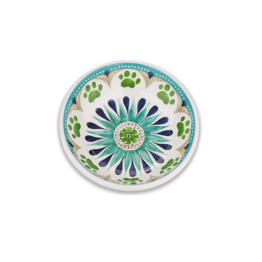 Lightweight melamine saucer with teal flower design. Dishwasher safe, break resistant, with non-skid silicone base.