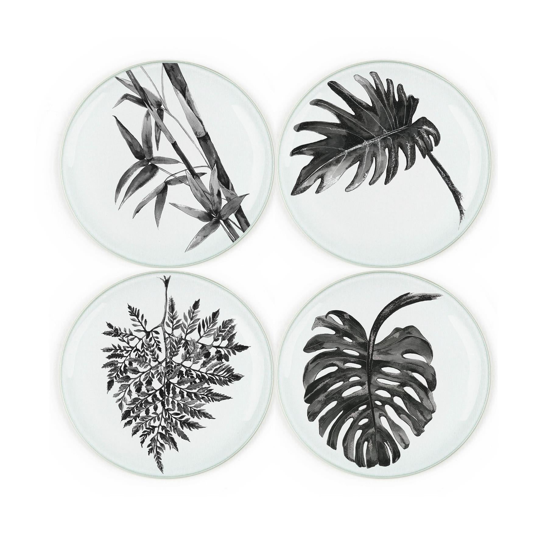 Set of four round tempered glass coasters featuring ink drawn leaf designs