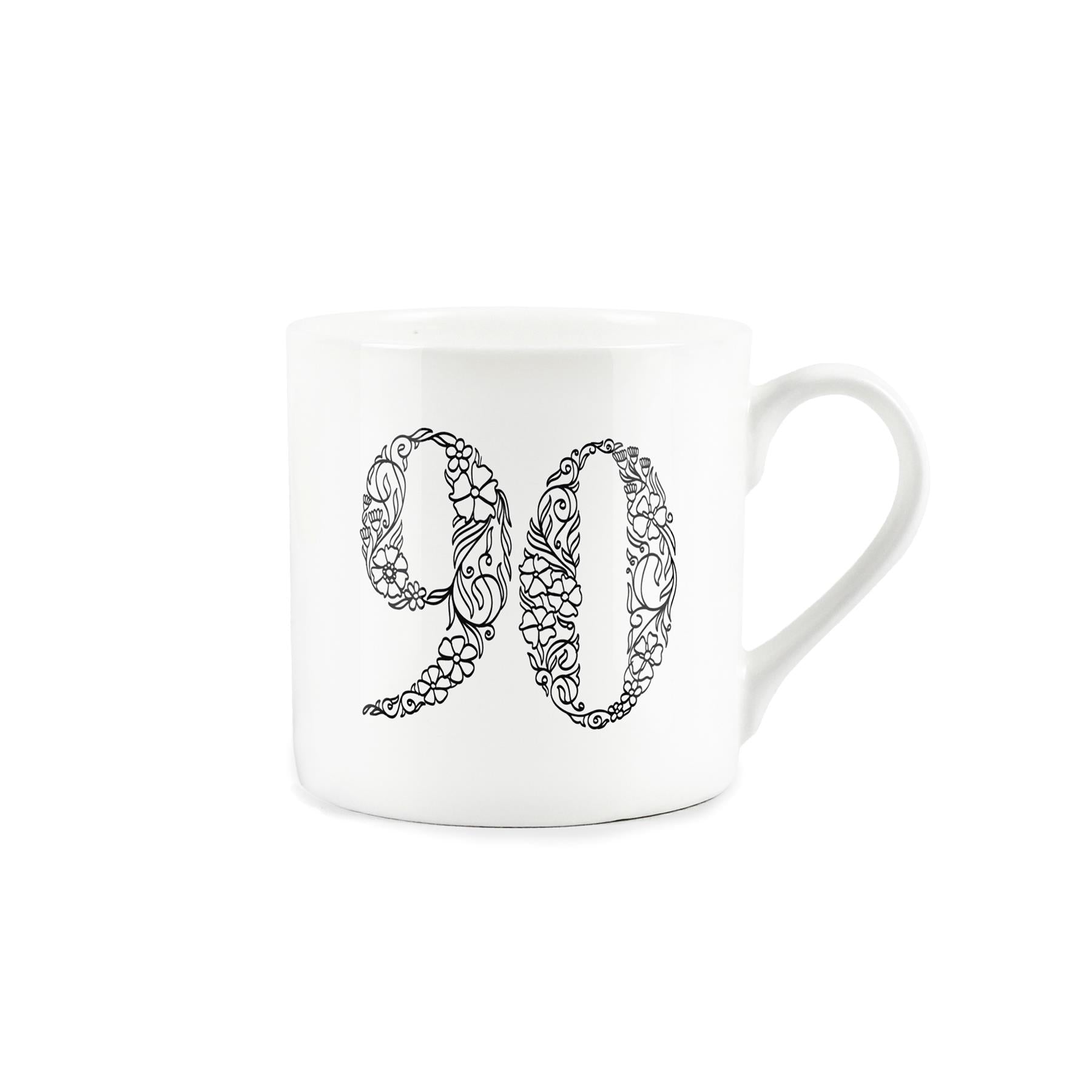 White bone china mug featuring floral line drawing of the number 90