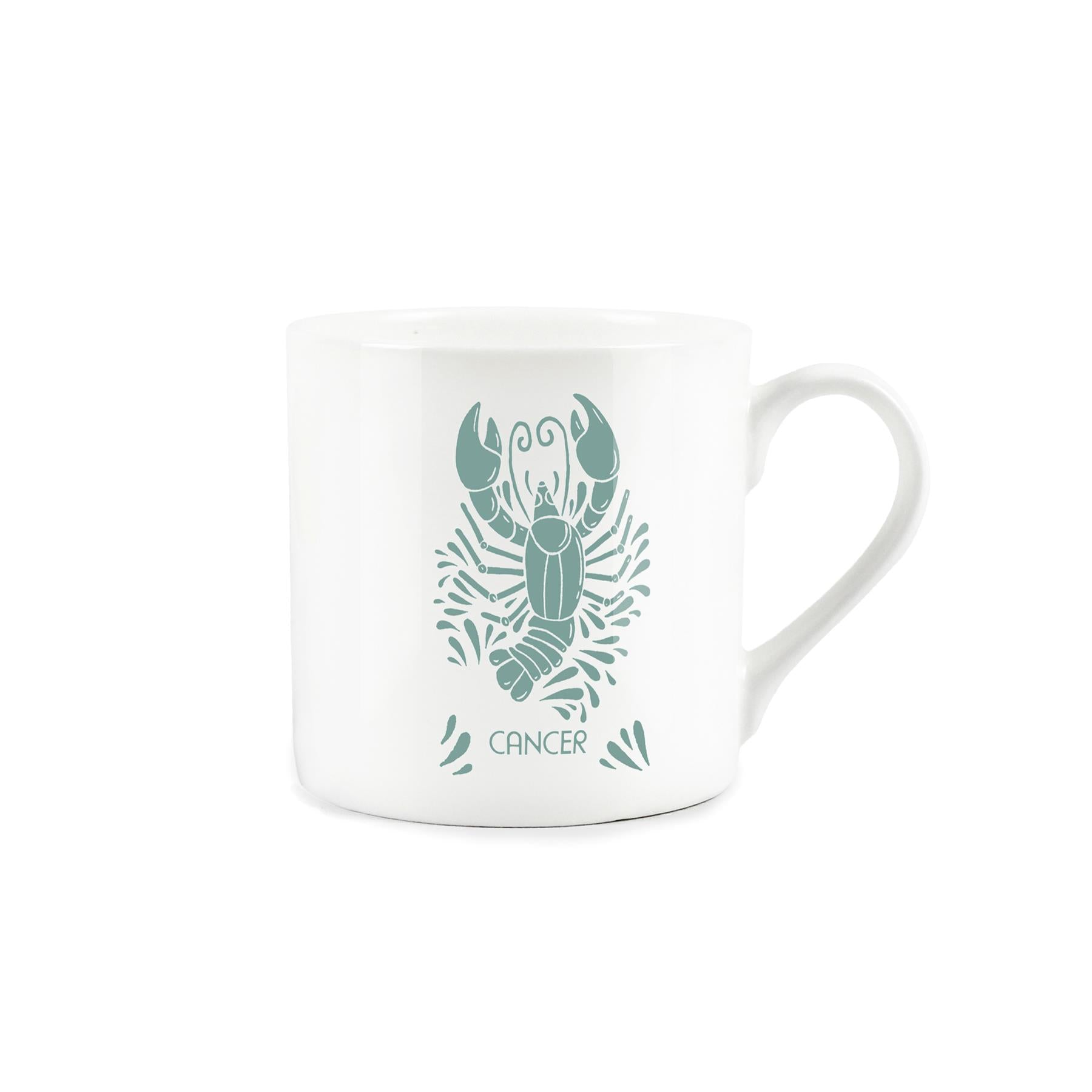 Muted green cancer star sign artwork displayed on a white bone china mug