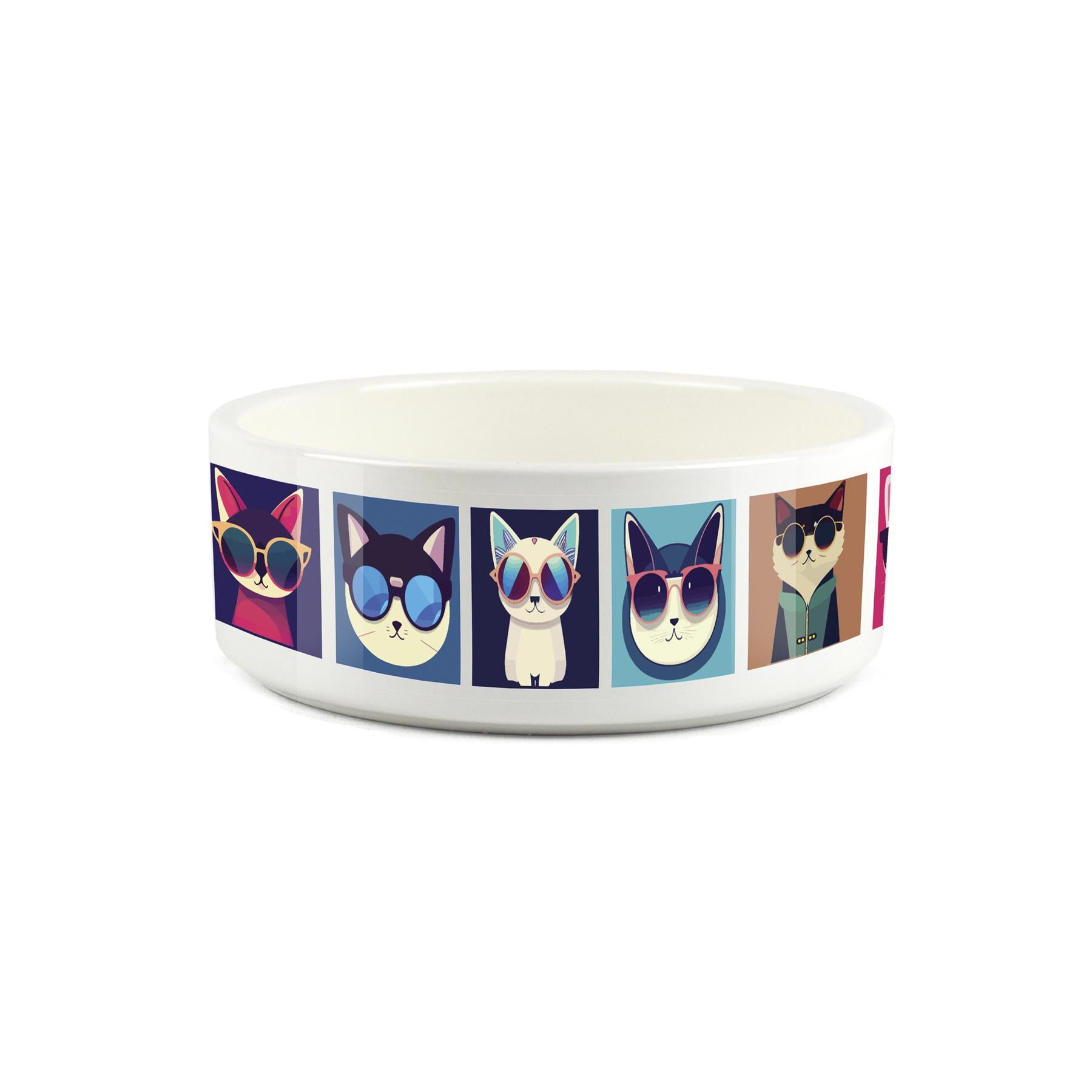 Small ceramic white pet bowl with pop art style cats wearing sunglasses printed on surface.