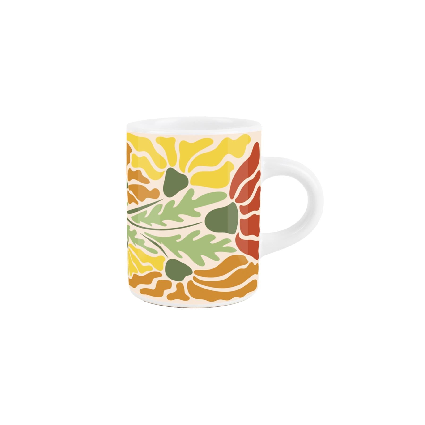 Small ceramic espresso mug with a delightful orange and yellow floral design, perfect for a morning pick-me-up! 75ml capacity, dishwasher safe.