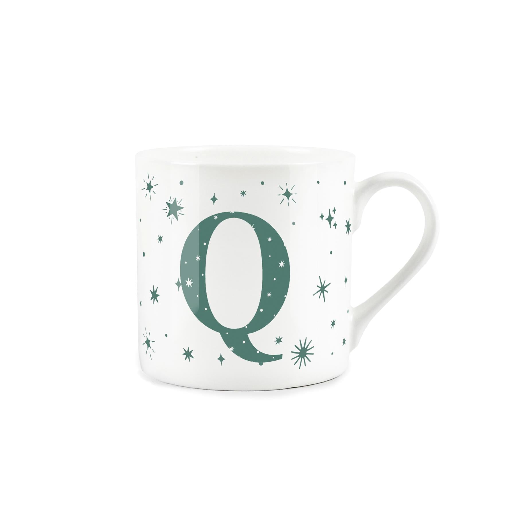 White bone china mug with green stars and letter 'Q' alphabet design