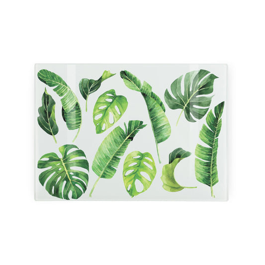 Glass worktop saver with vibrant tropical leaf design.