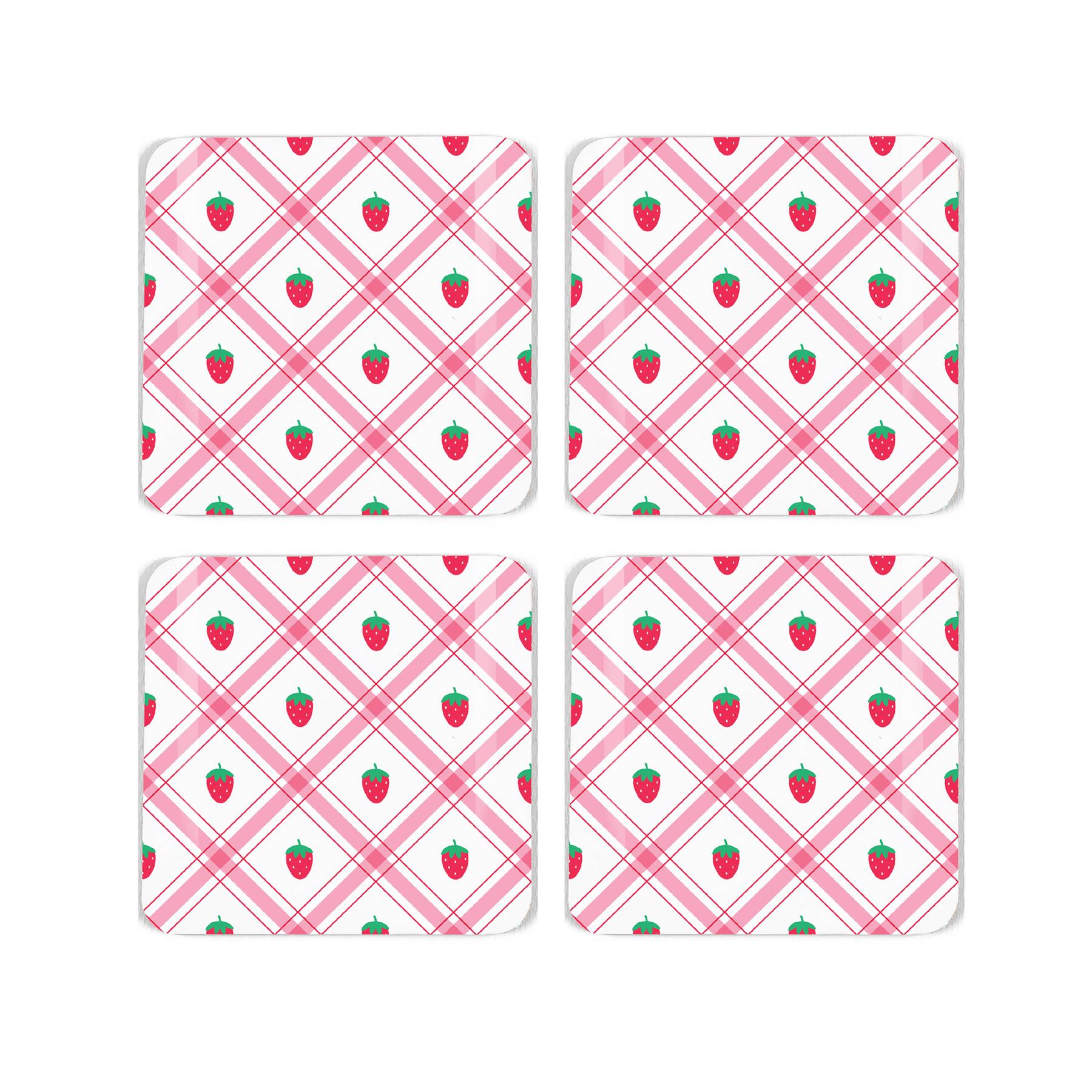 Four square cork coaster with a pretty gingham and strawberry repeating design on a white background