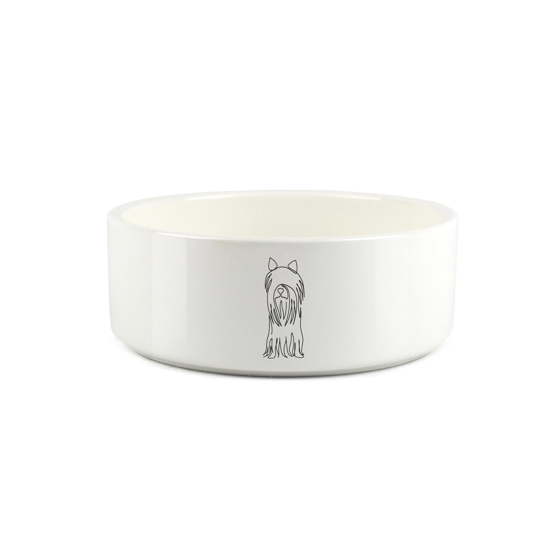 Minimalist line drawing of yorkshire terrier sitting on white ceramic pet bowl