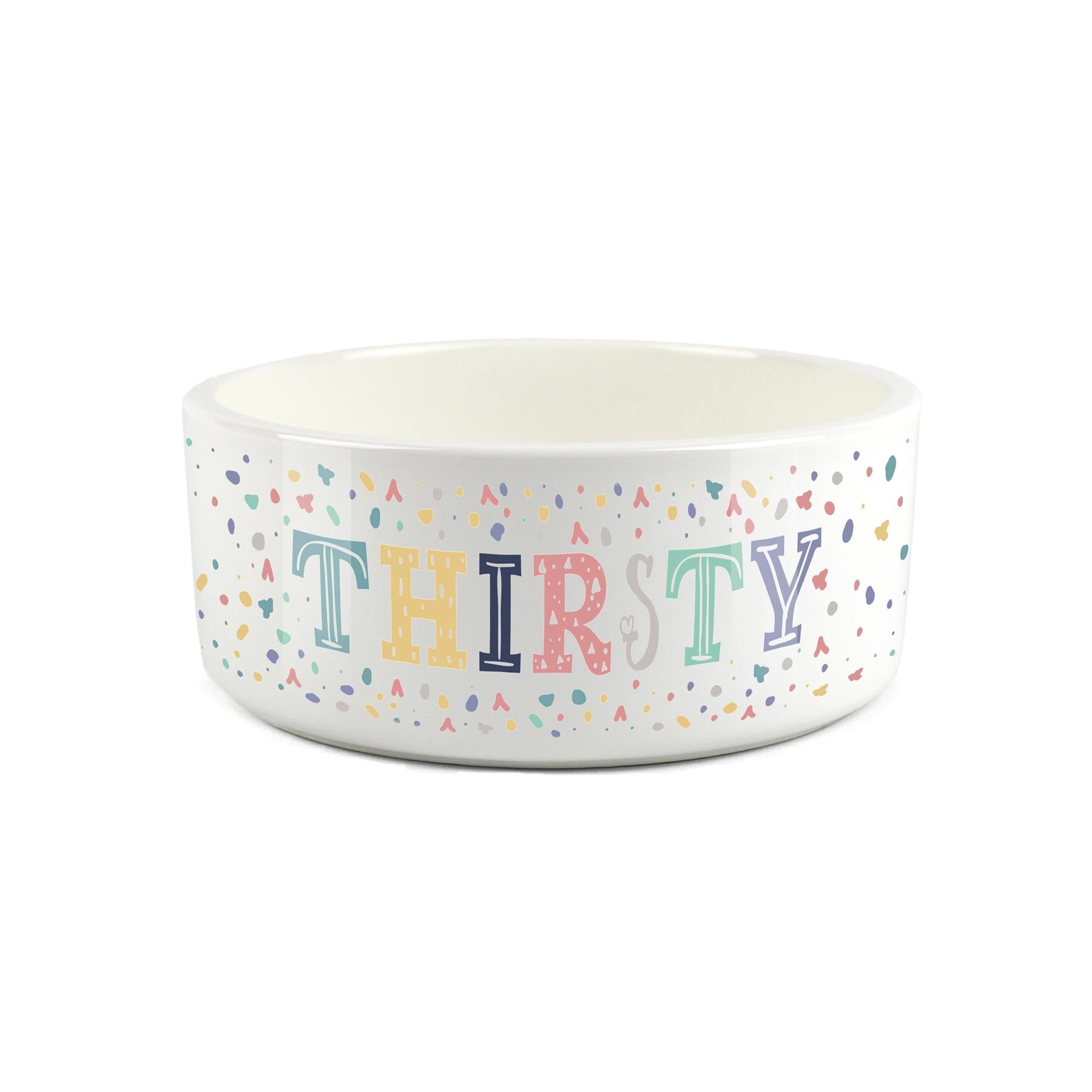 Colourful speckled thirsty design printed onto a large white ceramic pet bowl