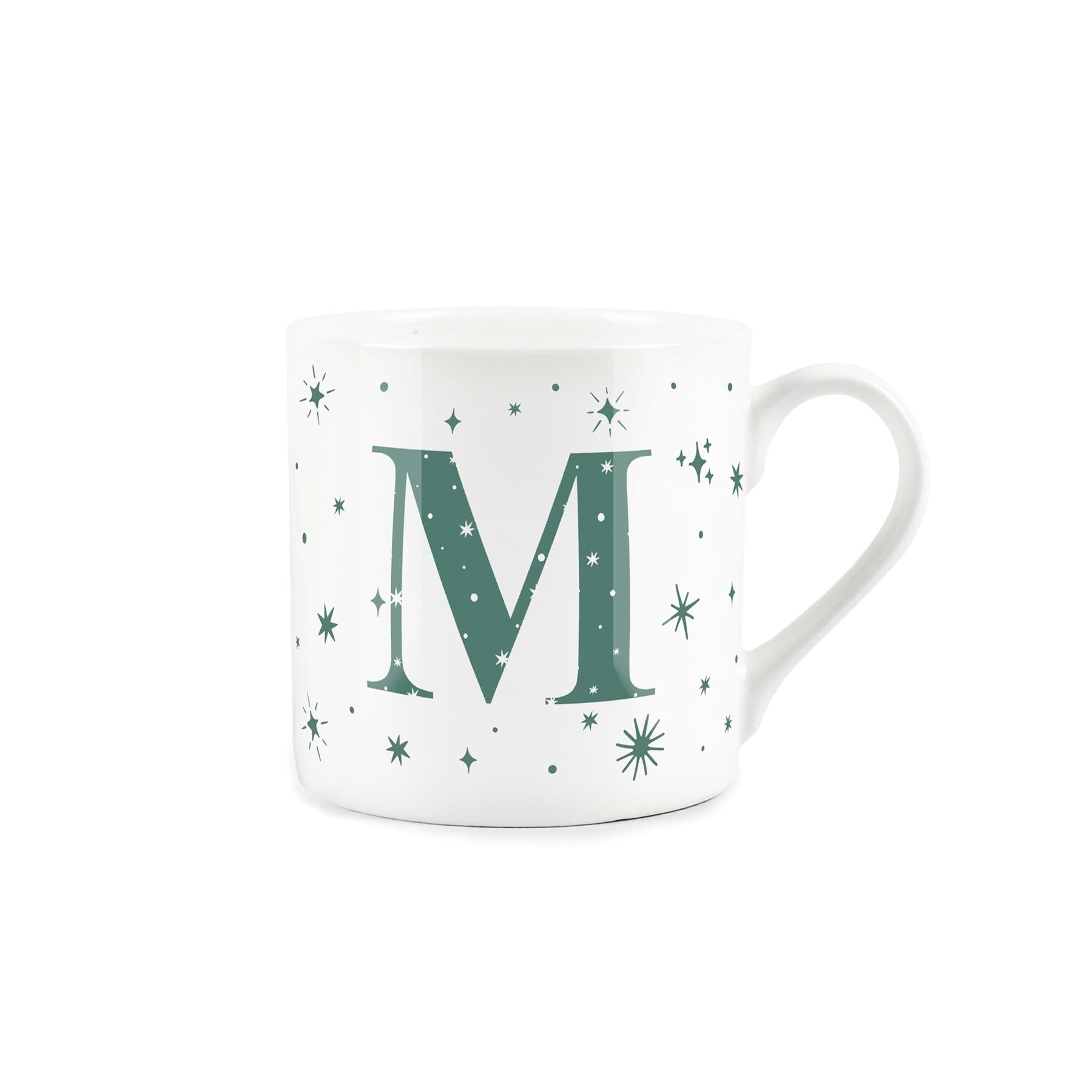White bone china mug with green stars and letter 'M' alphabet design