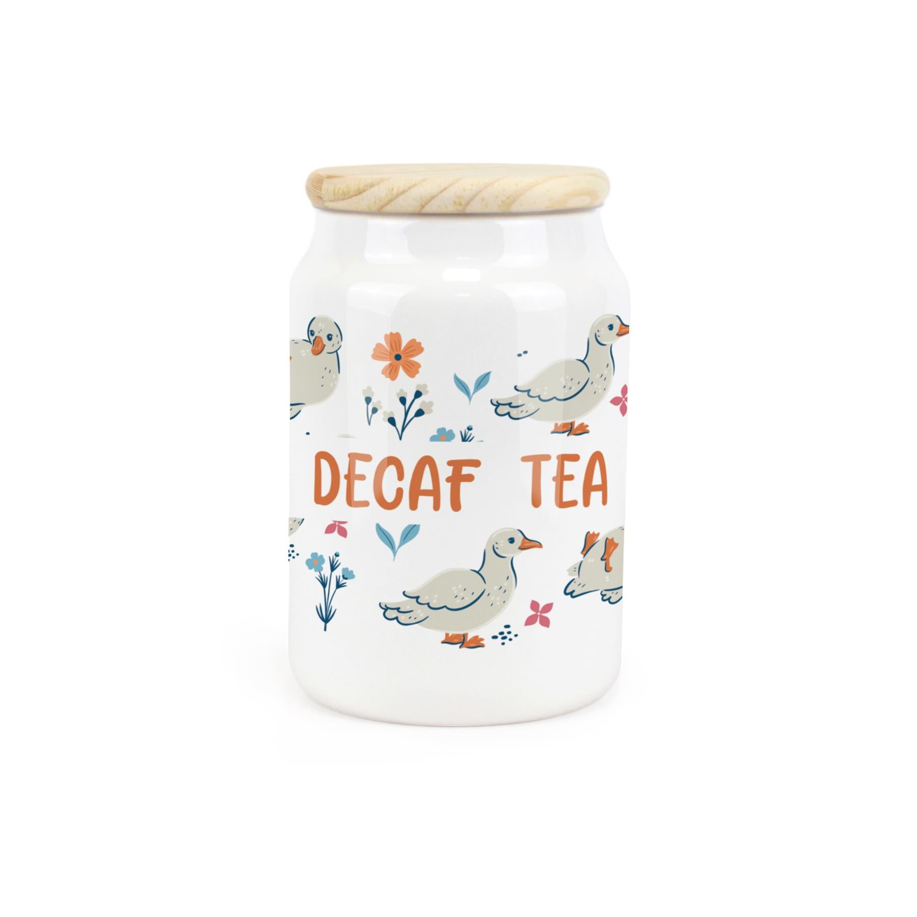 White ceramic canister featuring waddling ducks with a decaf tea design.