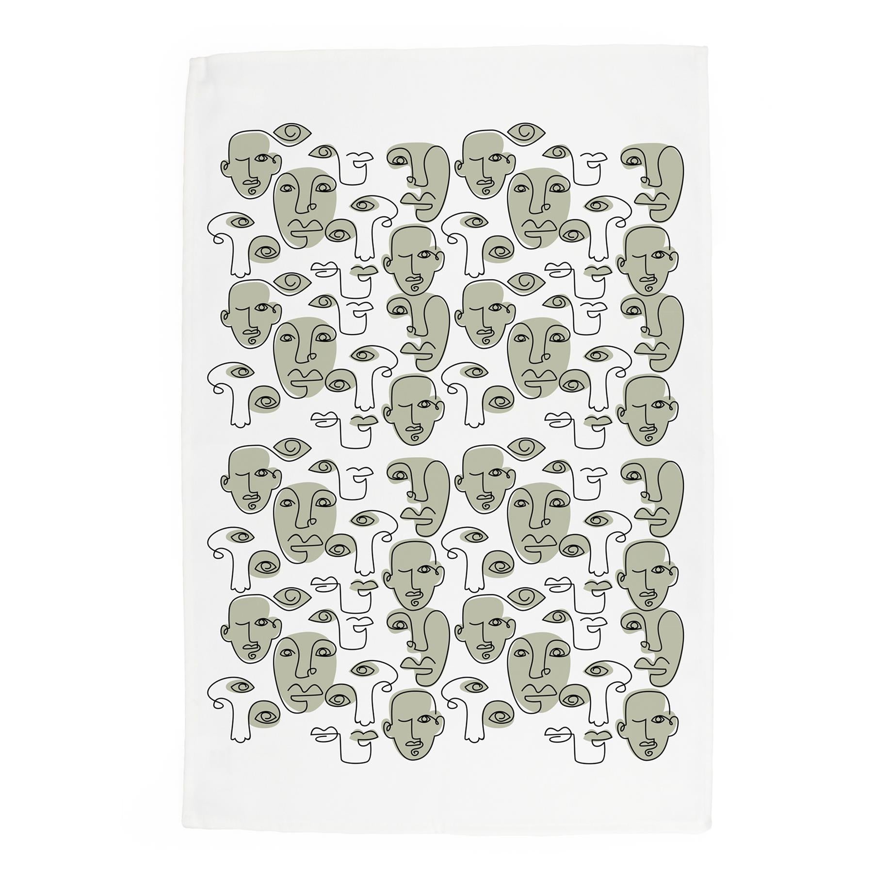 Design featuring abstract illustrations of faces printed on a white cotton kitchen towel