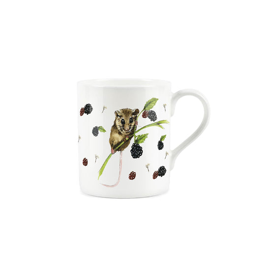 Watercolour artwork of dormouse & blackberries on a white bone china mug.