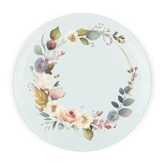 Round glass worktop protector with floral wreath design in pink, purple, green