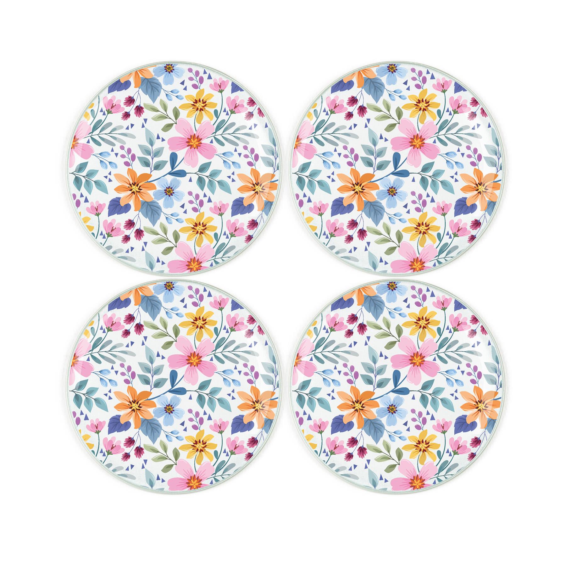 Vibrant blue and purple floral pattern design printed on four round tempered glass coasters