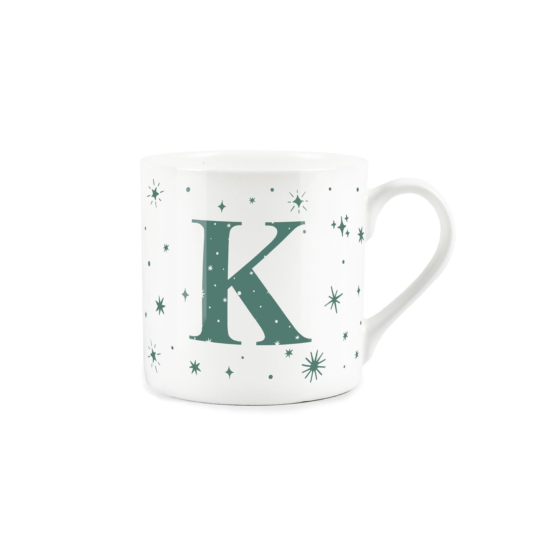 White bone china mug with green stars and letter 'K' alphabet design