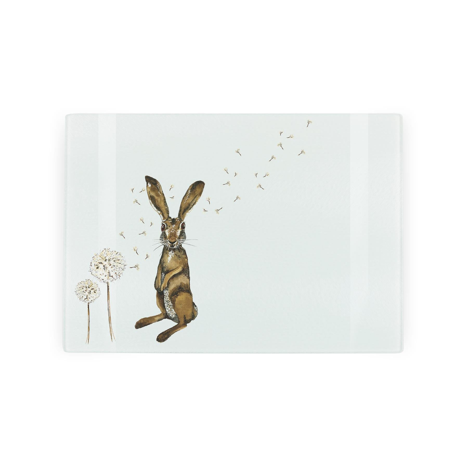 Glass worktop protector with hare and dandelion print by Rhiannon Chauncey.