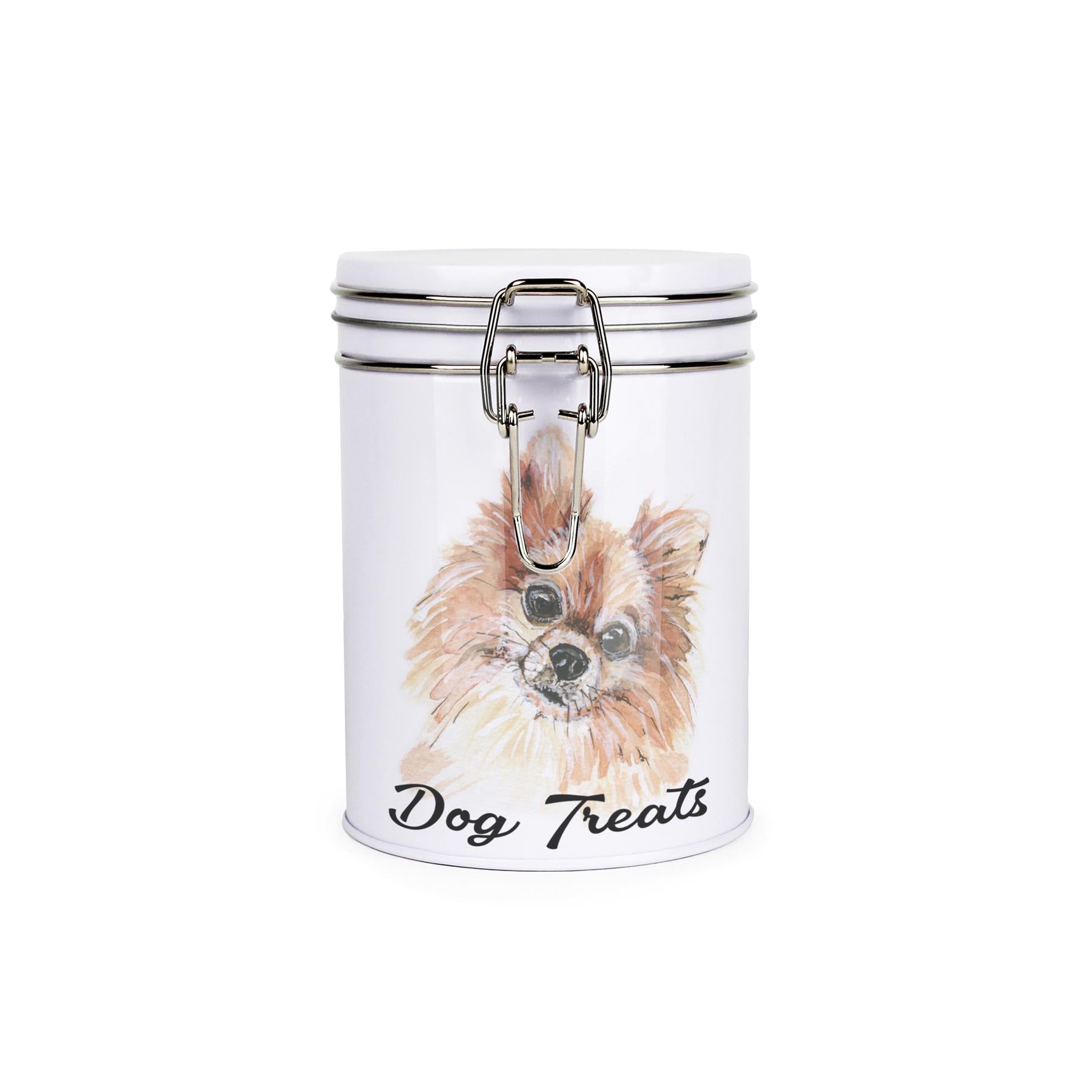 White tinplate canister with metal clip and lid featuring the face of a Pomeranian with the caption 'Dog Treats'