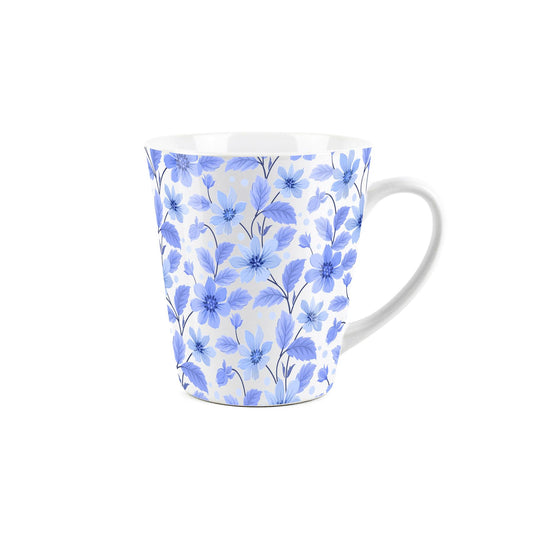 Small white latte mug featuring floral blue design