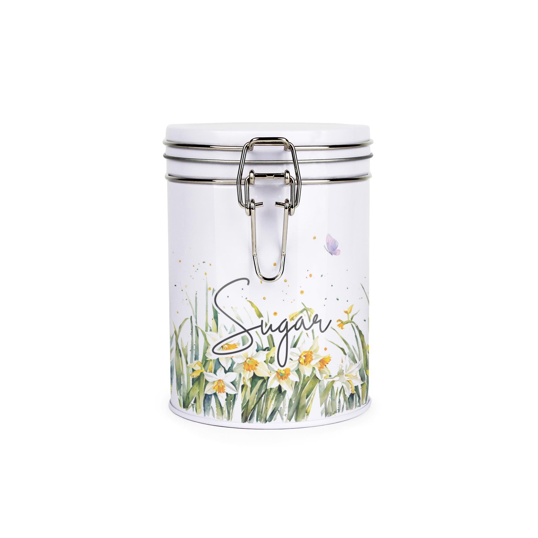 Metal canister with a metal clip and lid featuring a delicate daffodil print with butterflies and dragonflies and hot chocolate text