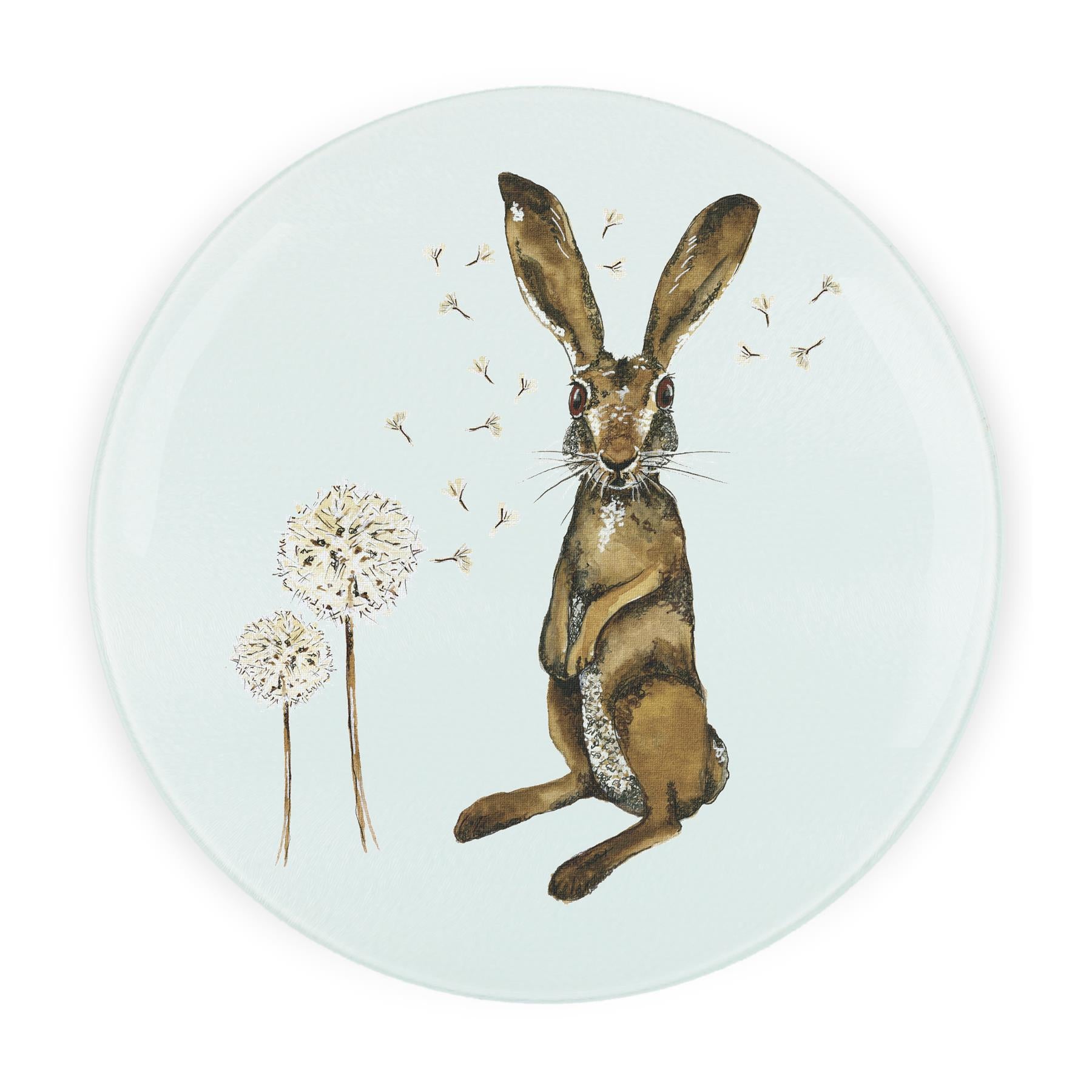 Round glass worktop protector with painted hare and dandelion print