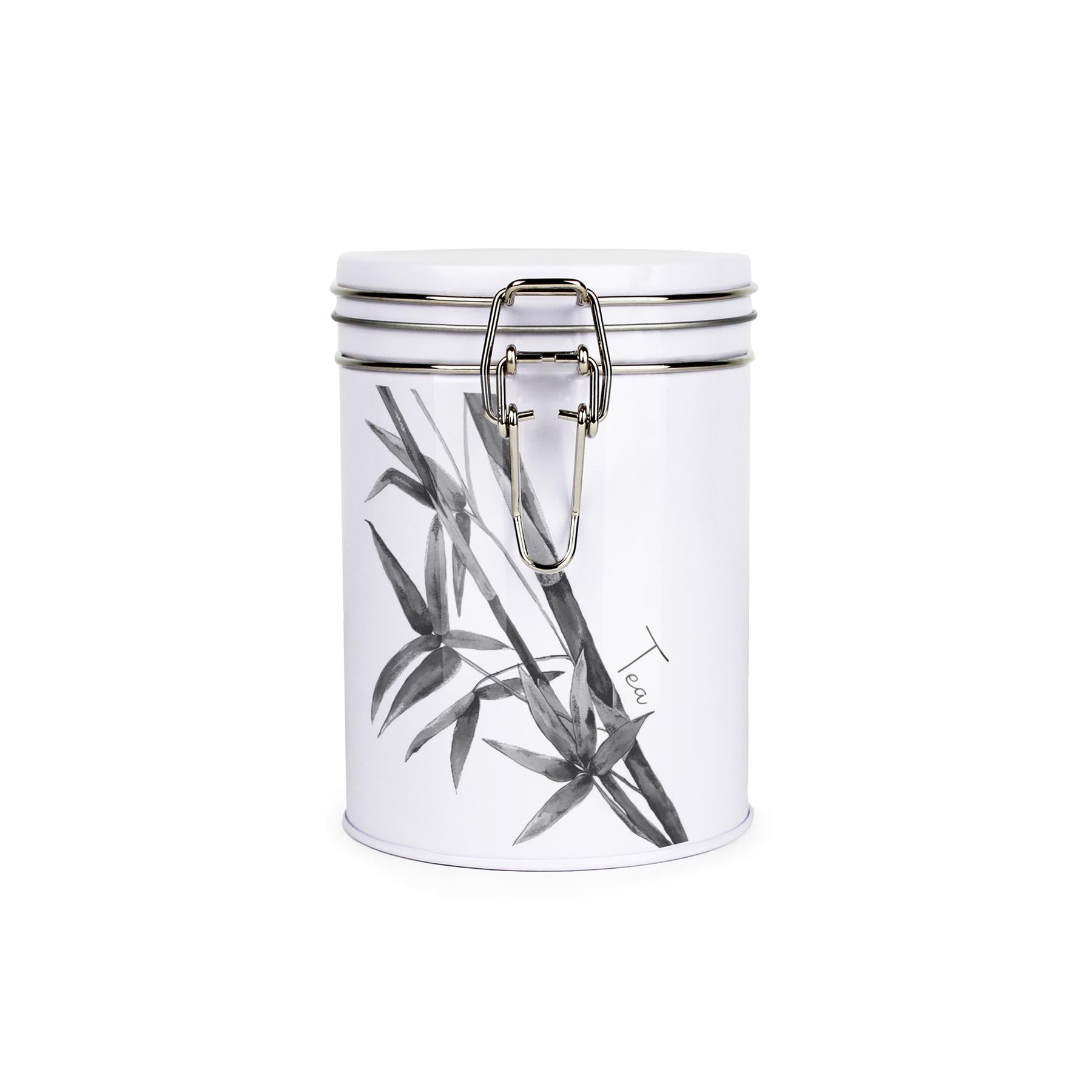 Tin metal storage canister with metal clip and lid featuring a black and white leaf design by Rhiannon Chauncey and tea text