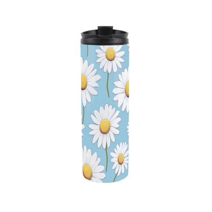 Travel mug featuring a blue daisies design 
