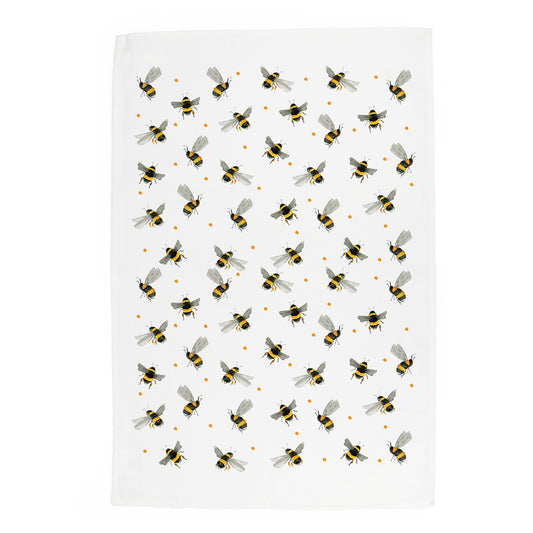 Painterly watercolour design of various bees in flight broken up by orange dots printed onto white cotton tea towel