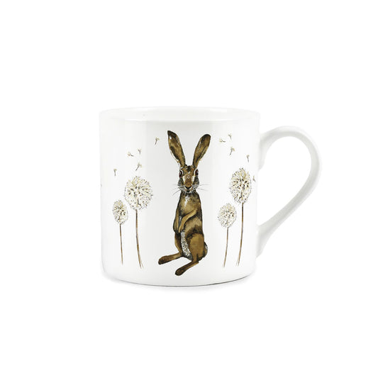 White mug featuring hares and dandelions design 