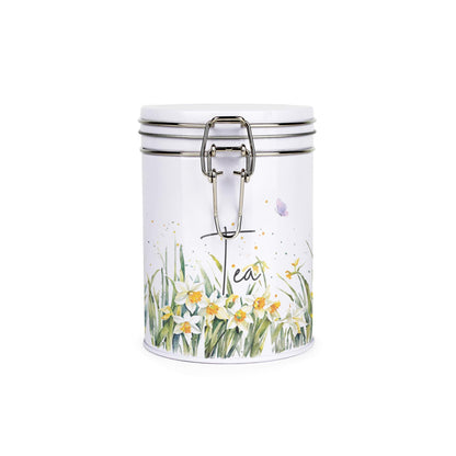Metal canister with a metal clip and lid featuring a delicate daffodil print with butterflies and dragonflies and sugar text
