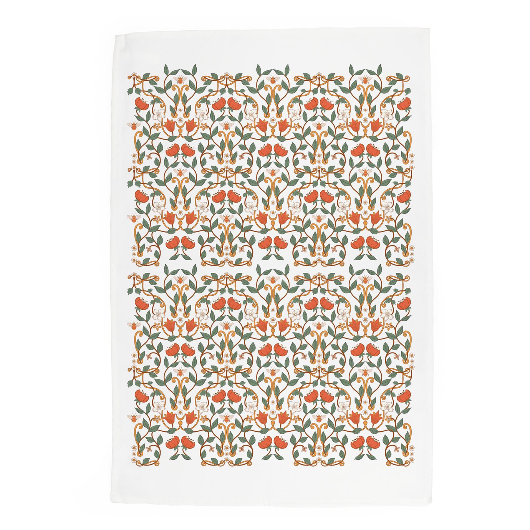 Intricate floral orange flower & green leaf design on a white panama cotton kitchen towel
