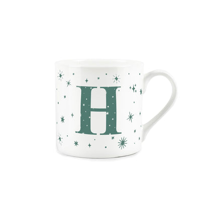 White bone china mug with green stars and letter 'H' alphabet design 