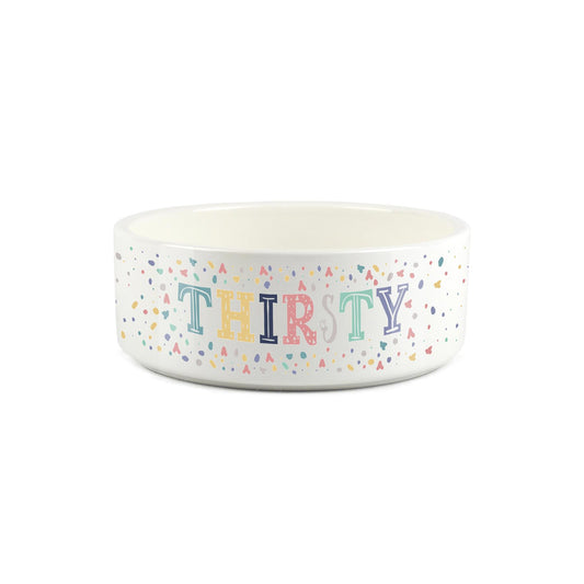 Colourful speckled thirsty design printed onto a small white ceramic pet bowl