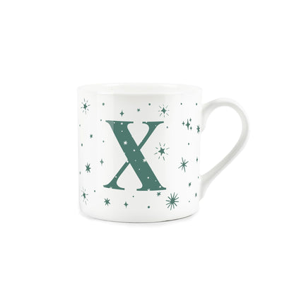 White bone china mug with green stars and letter 'X' alphabet design 